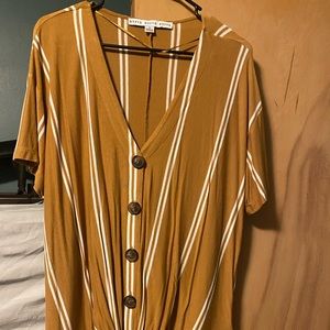 Mustard yellow top with tie bow at bottom front